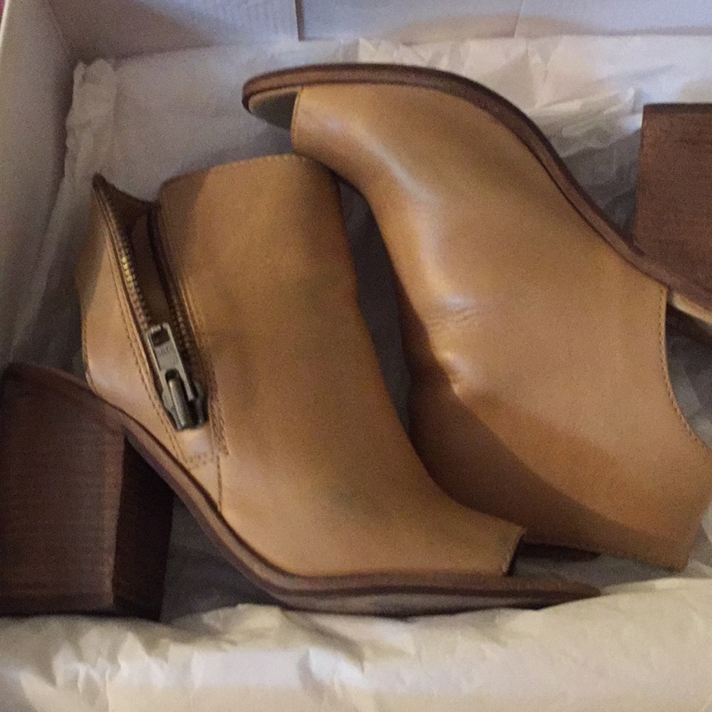 Peep toe open back bootie